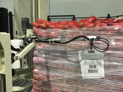 double arm wrapping integrated pallet label applicator